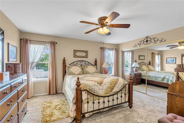 26725 Farrell St, Menifee, CA 92586 - bedroom with light carpet, multiple windows, and ceiling fan