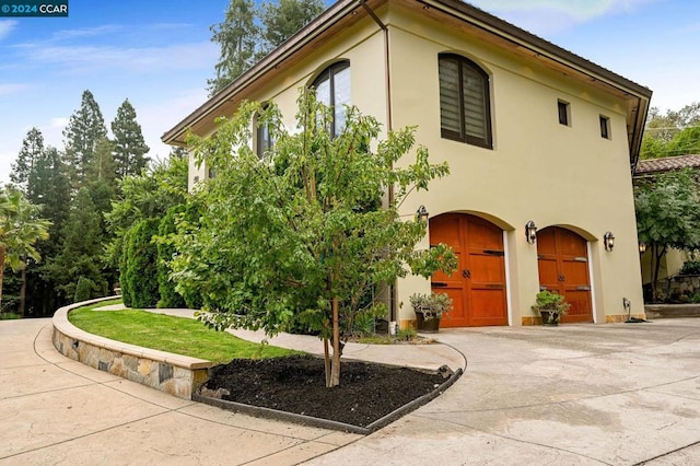 exterior space with a garage