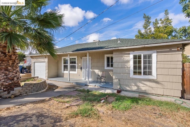 single story home with a garage