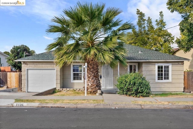 ranch-style home with a garage