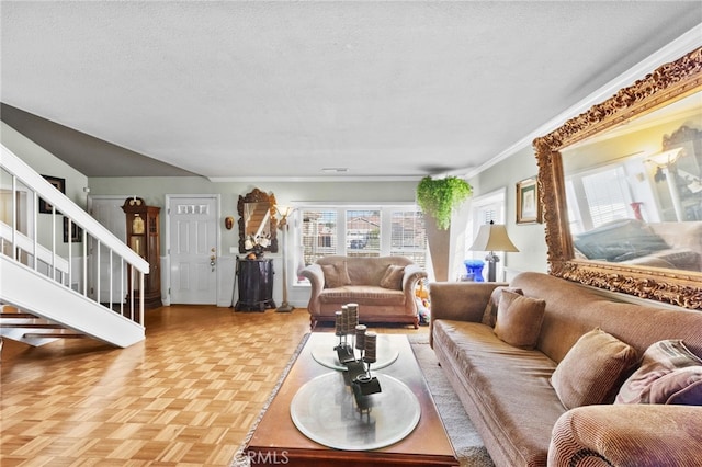 living room with parquet flooring, crown molding, and a textured ceiling