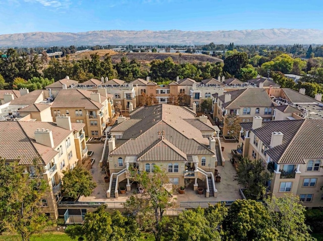 bird's eye view with a mountain view