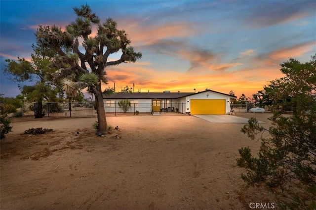 view of front of property with a garage