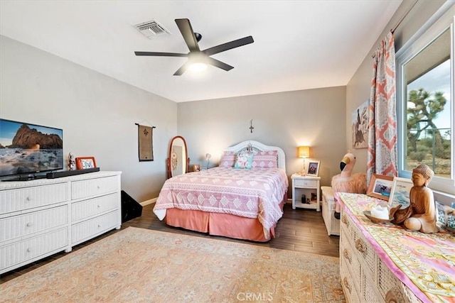 bedroom featuring ceiling fan and dark hardwood / wood-style flooring