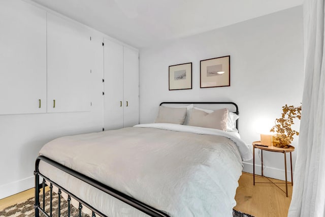 bedroom featuring light hardwood / wood-style flooring