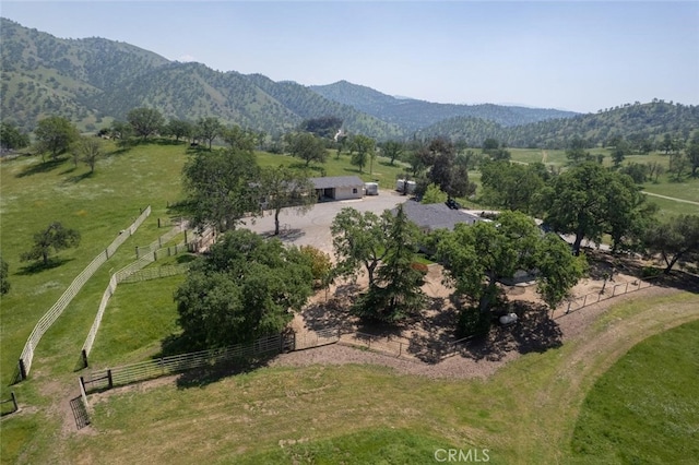 drone / aerial view featuring a mountain view and a rural view