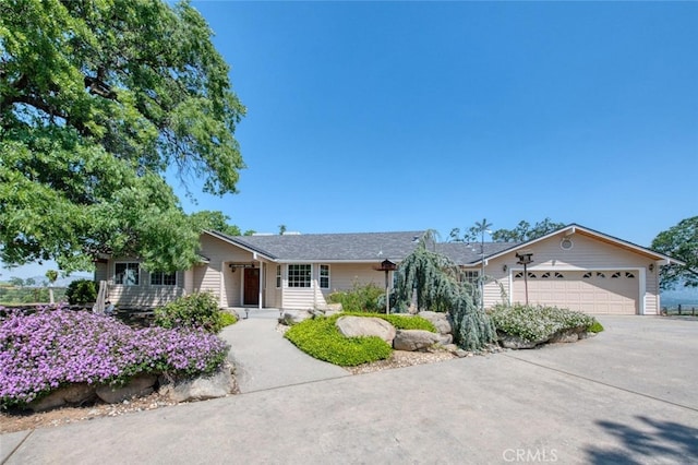 ranch-style home with a garage