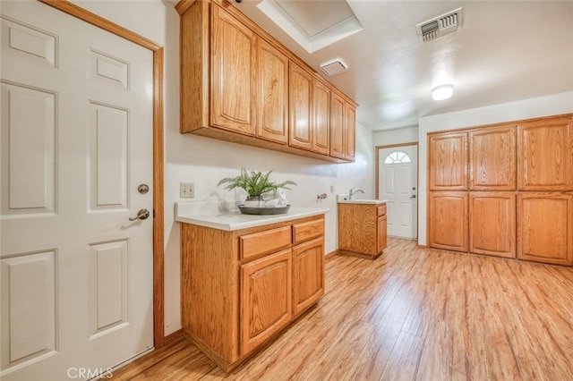 kitchen with light hardwood / wood-style flooring