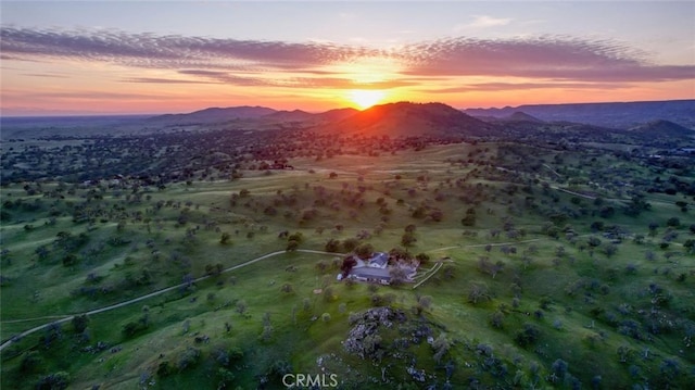 aerial view at dusk with a mountain view