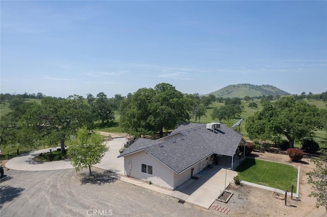 drone / aerial view featuring a mountain view