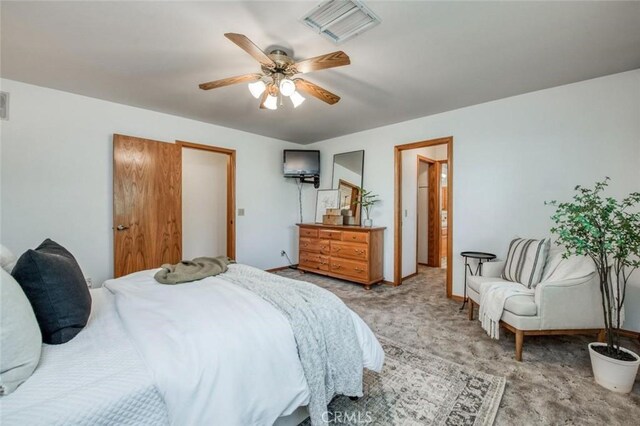 18486 Tollhouse Rd, Clovis, CA 93619 - bedroom featuring light carpet, ceiling fan, and baseboards