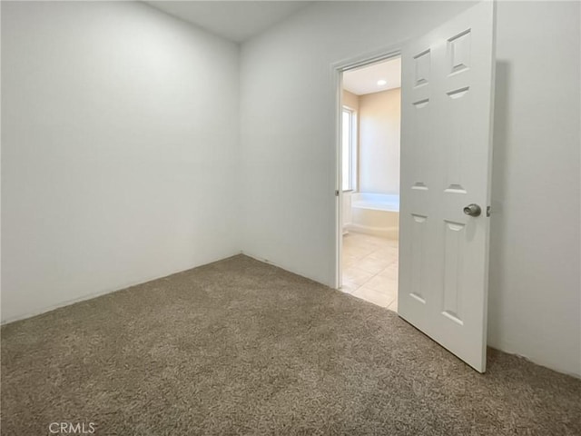 view of carpeted spare room