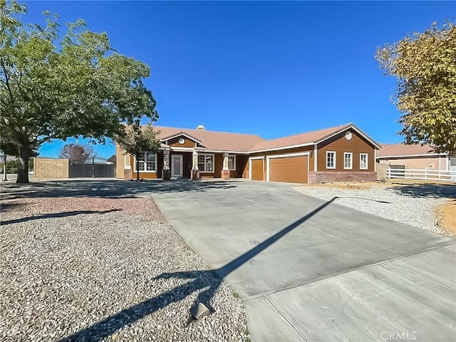 single story home featuring a garage