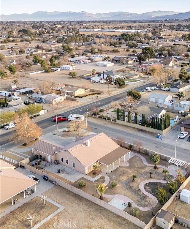 birds eye view of property with a residential view and a mountain view