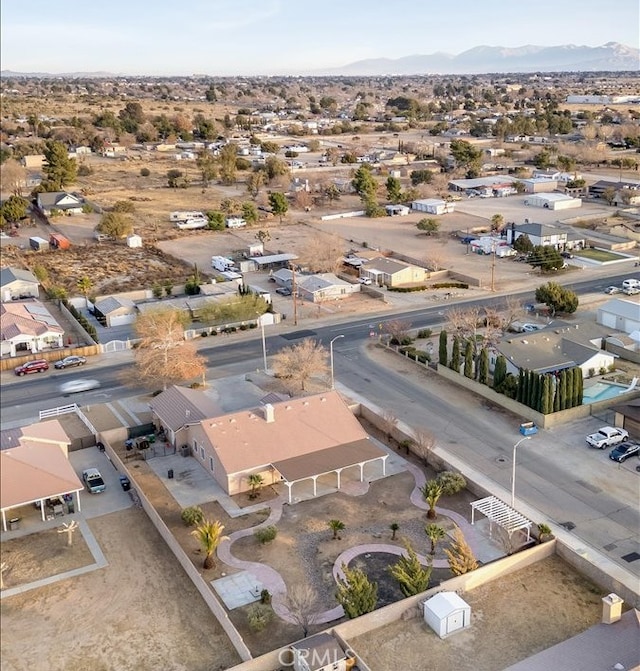 bird's eye view featuring a residential view and a mountain view