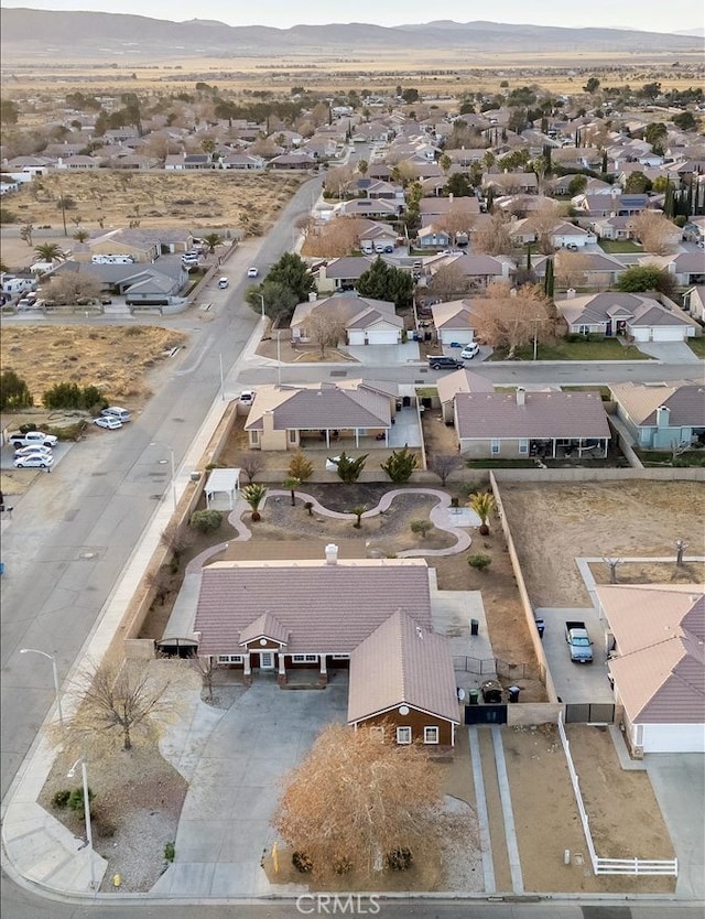 bird's eye view featuring a residential view and a mountain view