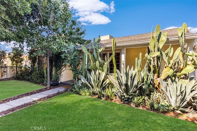 exterior space featuring a front lawn