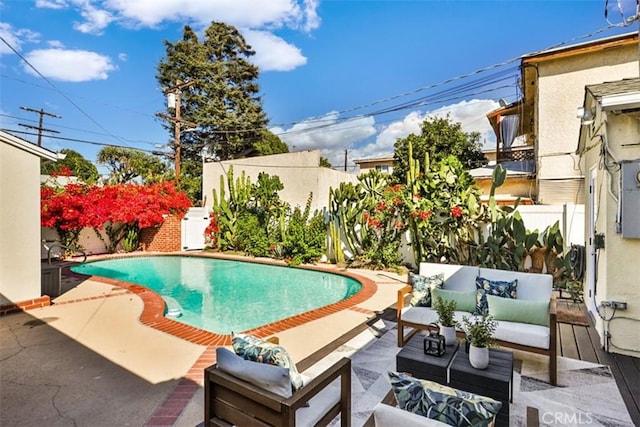 view of pool featuring a patio area and an outdoor hangout area