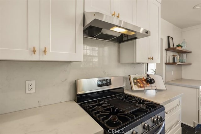 kitchen with white cabinets and stainless steel range with gas stovetop