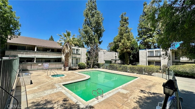 view of pool featuring a patio area