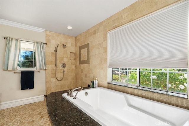 bathroom with tile patterned flooring, a healthy amount of sunlight, crown molding, and plus walk in shower