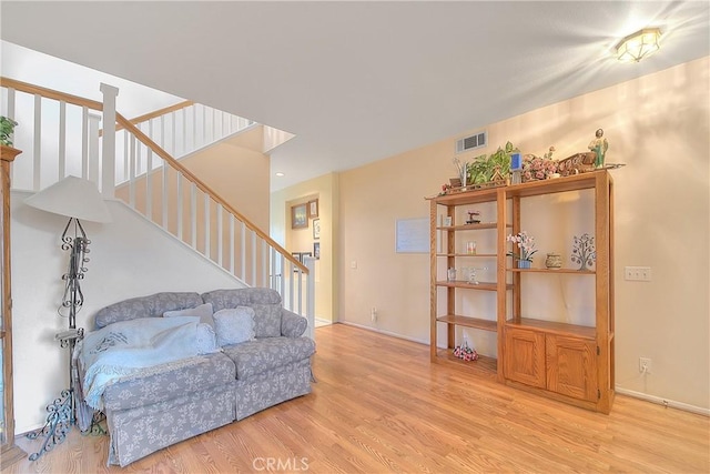 living room with light hardwood / wood-style floors