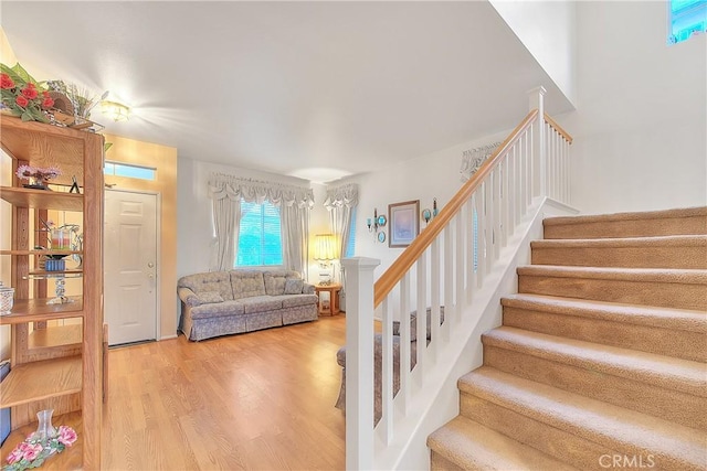 stairway with wood-type flooring