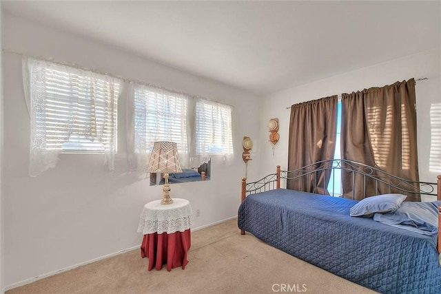 bedroom featuring carpet flooring