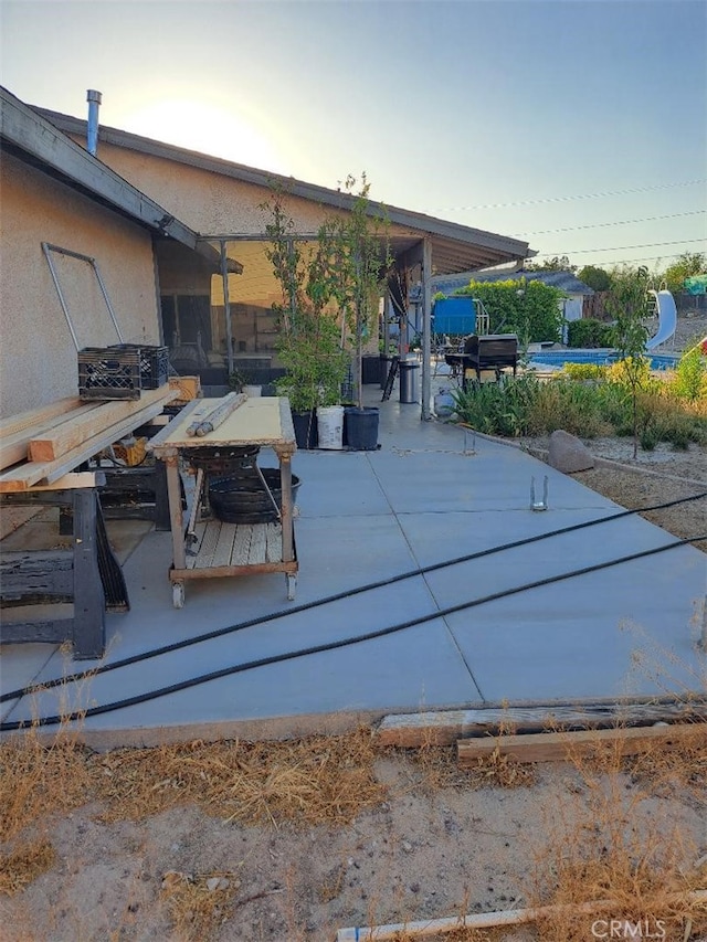 exterior space with a patio