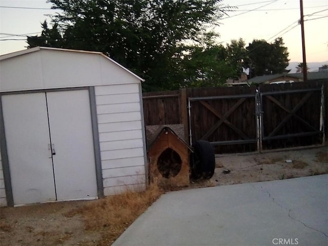 view of outdoor structure at dusk