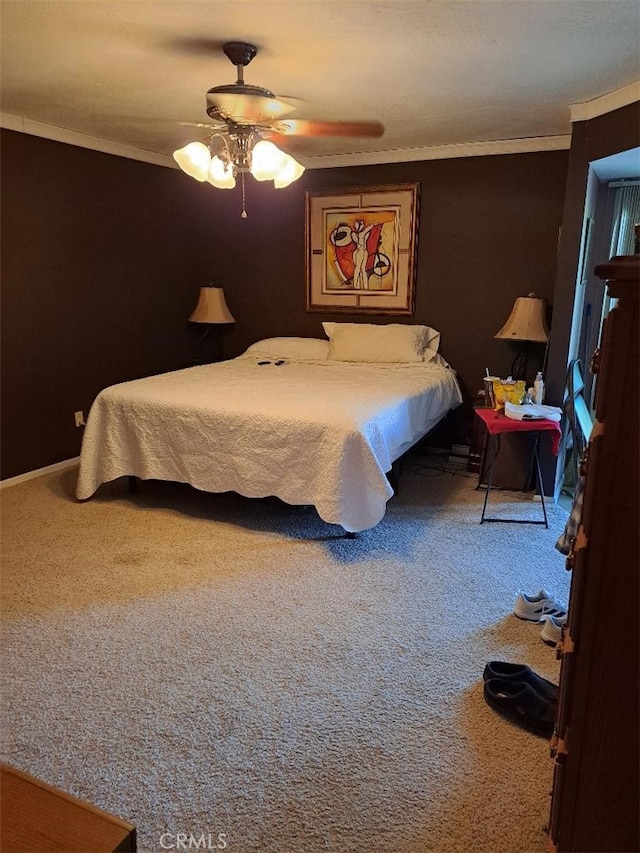 bedroom featuring carpet, ceiling fan, and ornamental molding