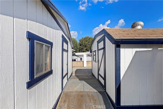 view of side of property featuring a patio area