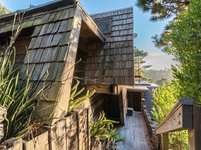 view of side of home featuring a deck