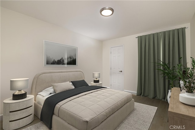 bedroom featuring dark hardwood / wood-style flooring