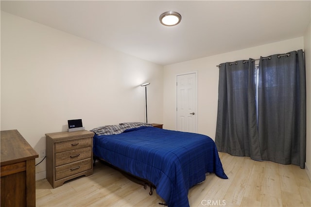 bedroom featuring light hardwood / wood-style flooring