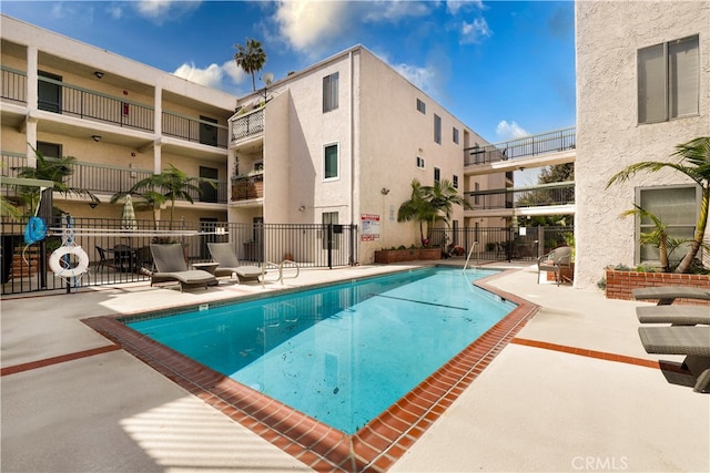 view of pool featuring a patio area