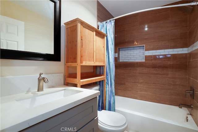 full bathroom with vanity, shower / bath combination with curtain, and toilet