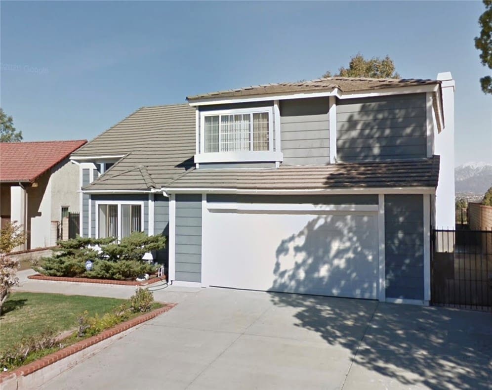 front facade with a garage