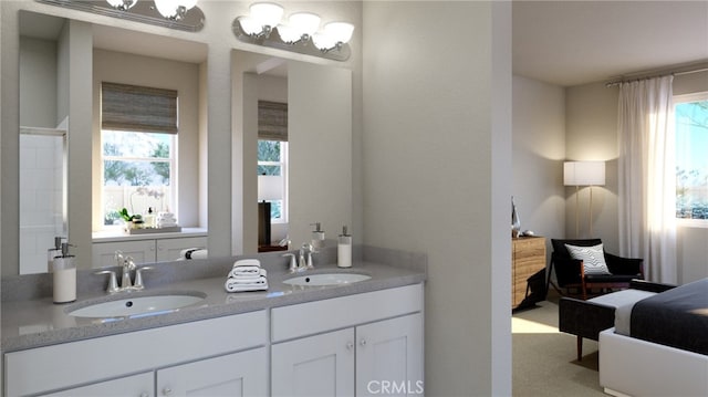 bathroom with vanity and plenty of natural light