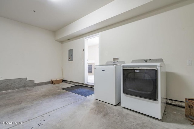 washroom featuring independent washer and dryer and electric panel