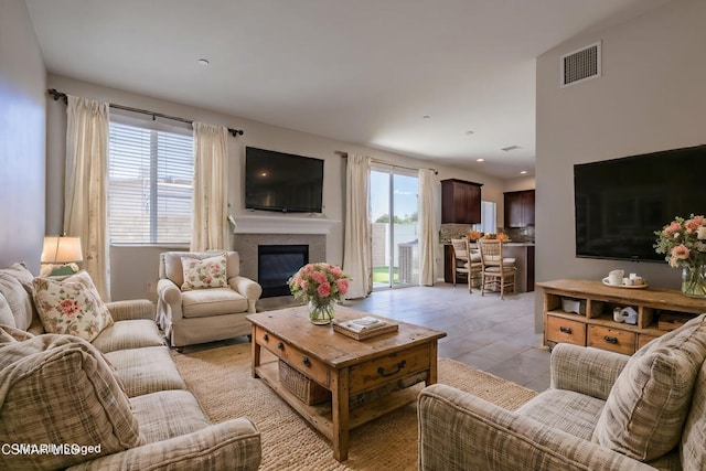 living room with light tile patterned floors