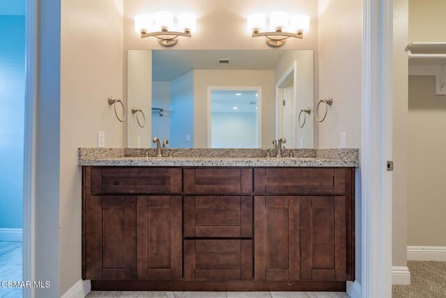 bathroom featuring vanity