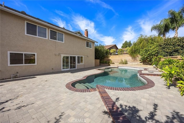 view of swimming pool featuring a patio