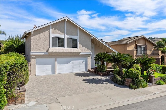 view of front of property featuring a garage