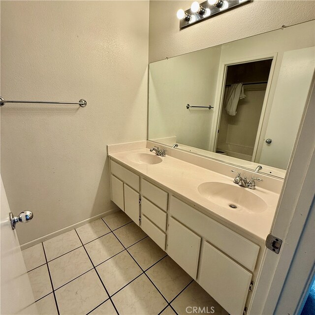 bathroom featuring vanity and tile patterned floors