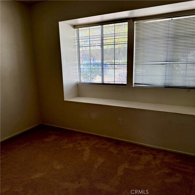 view of carpeted spare room