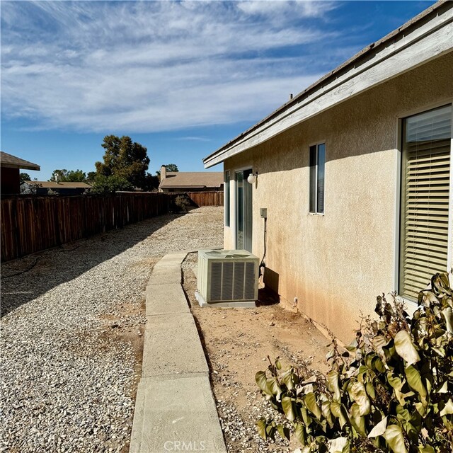 view of property exterior featuring cooling unit