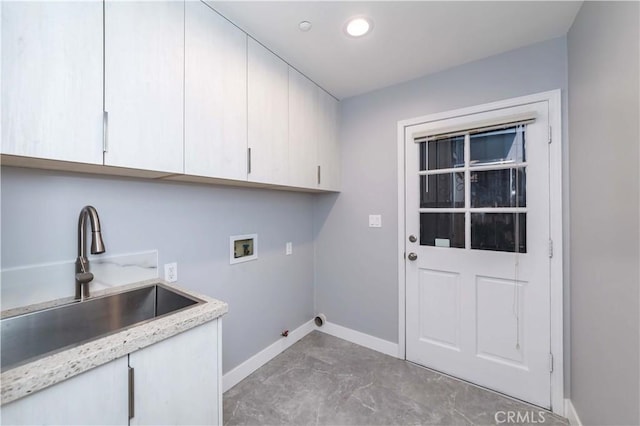 laundry area featuring cabinets, washer hookup, hookup for a gas dryer, and sink