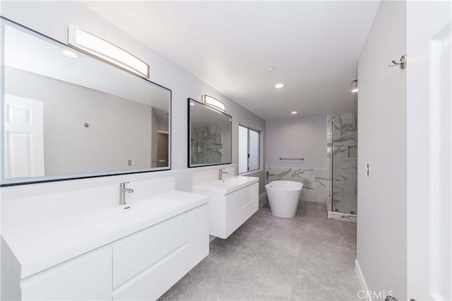 bathroom featuring vanity, tile walls, and plus walk in shower