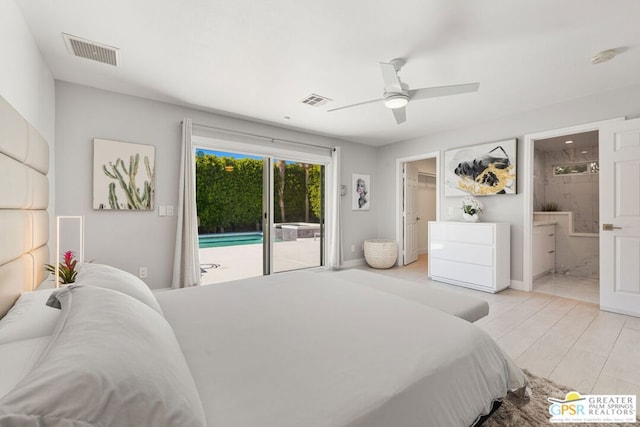 bedroom with ceiling fan, access to outside, and ensuite bath